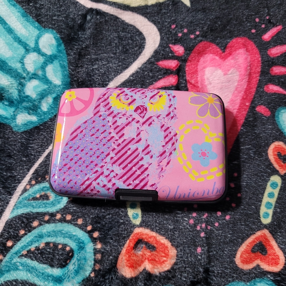 Hard plastic owl card holder